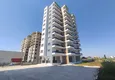 Купить Квартиры 1+1 с чистовой отделкой в новом жилом комплексе в районе Томюк – Мерсин 1