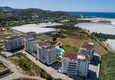Купить Квартира 2+1 с видом на горы и крепость в комплексе комфорт-класса с собственным пляжем, район Демирташ – Алания 2 