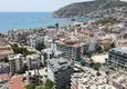 Купить Инвестиционно-привлекательный проект в самом центре Алании – 250 метров от моря 1