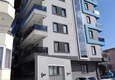 Купить Срочная продажа! Меблированная двухкомнатная квартира в новой резиденции в в 250 метрах - район Махмутлар 2