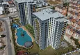Купить Квартира 1+1 от застройщика в многоквартирном комплексе - Анталии, район Кепез  3 