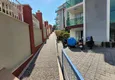 Купить Двухэтажная квартира с видом на море и горы в Алании, район Каргыджак 11