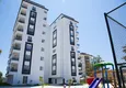 Купить Аренда квартира в Алании, район Авсаллар с мебелью в комплексе с частным пляжем  13 