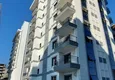 Купить Квартира 1+1 с чистовой отделкой в многоквартирном жилом комплексе в Махмутларе – центр 1 