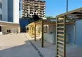 Купить Квартира 1+1 с чистовой отделкой в многоквартирном жилом комплексе в Махмутларе – центр 3 
