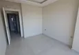 Доступная покупка Квартира 1+1 с чистовой отделкой и видом на море в районе Махмутлар – Алания 4