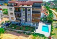 Купить Пентхаус-дуплекс 4+1 с мебелью и боковым видом на море в районе Авсаллар 4 