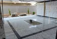 Купить Квартира 1+1 с чистовой отделкой в многоквартирном жилом комплексе в Махмутларе – центр 8 