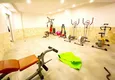 Купить Двухкомнатная квартира в районе Махмутлар, меблированная с видом на море 22