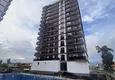 Купить Срочная продажа! Квартира 1+1 в строящимся доме Арпачбахшиш – Мерсин 1 