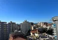 Купить Линейные апартаменты с мебелью, отдельной кухней и застекленным балконом в центре Алании 5