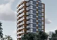 Купить Квартиры 1+1 в строящимся жилом комплексе в прекрасном районе Аяш – Мерсин 4 