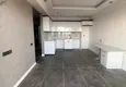 Купить Двухкомнатная квартира с видом на море и чистовой отделкой в районе Аяш – Мерсин 1