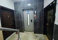 Купить Трехкомнатная квартира с отдельной кухней в курортном городке рядом с морем – район Махмутлар 11