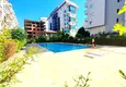 Купить Трехкомнатная квартира с отдельной кухней в курортном городке рядом с морем – район Махмутлар 2