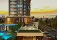 Купить Строящийся жилой комплекс сегмента премиум, квартиры с видом на море – Измир, Конак 8 