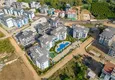 Купить Линейная четырёхкомнатная квартира с отдельной кухней в районе Оба, Алания 9 