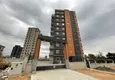 Доступно Городская квартира 4+1 в строящимся жилом комплексе район Торослар-Мерсин 4