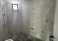 Доступная покупка Квартира 2+1 с чистовой отделкой и видом на море в районе Силифке-Мерсин 15