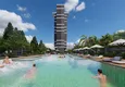 Купить Курортная недвижимость на этапе проекта – Алания, район Махмутлар, первая береговая линия 14 