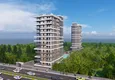 Купить Курортная недвижимость на этапе проекта – Алания, район Махмутлар, первая береговая линия 1 