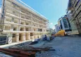 Доступно Квартира 1+1 от инвестора в строящемся комплексе в центре Алании в 450 метрах от пляжа Клеопатра 4