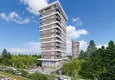 Купить Курортная недвижимость на этапе проекта – Алания, район Махмутлар, первая береговая линия 7 
