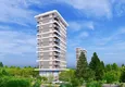 Купить Курортная недвижимость на этапе проекта – Алания, район Махмутлар, первая береговая линия 9 