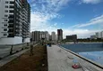 Купить Квартира 1+1 с видом на море на завершающем этапе строительства район Томюк-Мерсин 7