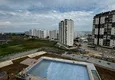 Купить Квартира 1+1 с видом на море на завершающем этапе строительства район Томюк-Мерсин 12