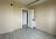 Доступная покупка Квартира 4+1 с отдельной кухней и сауной в районе Мезитли-Мерсин 6 