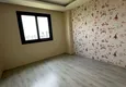 Доступная покупка Квартира 4+1 с отдельной кухней и сауной в районе Мезитли-Мерсин 10 
