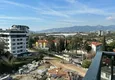 Доступная покупка Двухкомнатная квартира с видом на море и горы в новостройке – Алания, район Махмутлар 12