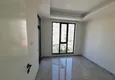 Доступная покупка Двухкомнатная квартира с чистовой отделкой в новостройке в центре престижного района Алании, Оба 6 