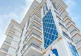 Купить Недвижимость в Алании – двухкомнатная квартира с чистовой отделкой в районе Махмутлар 3 