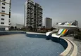 Купить Двухкомнатная Квартира с Чистовой Отделкой и Видом на Горы в Районе Томюк, Мерсин. Возможна рассрочка 6 