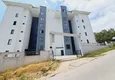 Купить Двухуровневый пентхаус с чистовой отделкой и видом на море в районе Махмутлар, Алания 6 