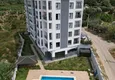 Купить Двухуровневый пентхаус с чистовой отделкой и видом на море в районе Махмутлар, Алания 4 