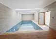 Купить Квартира 1+1 с видом на горы и море, район Каргыджак в Алании 7