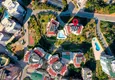 Купить Стильный видовой двухуровневый пентхаус в районе Тосмур, Алания 4 