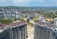 Доступно Квартира с 2 спальнями в комплексе на этапе строительства в Авсалларе, Алания 9