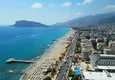 Купить Двухкомнатная квартира, полностью готовая к проживанию, в Алании - район Тосмур  2 