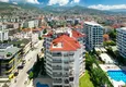 Купить Четырехкомнатная квартира с современным интерьером в Алании – район пляжа Клеопатра 3