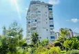 Купить Двухуровневый пентхаус с видом на море и горы в районе Джикджилли, Алания 4 