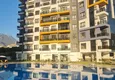 Купить Двухкомнатная квартира под ключ с видом на море и горы в Махмутларе, Алания 4 