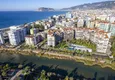 Купить Трехкомнатная квартира с мебелью в районе Тосмур, на берегу горной реки в 250 метрах от пляжа 1 
