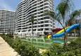 Купить Двухкомнатная квартира в Мерсине, район Арпачбахшиш в 300 метрах от моря 1 