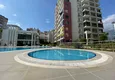 Купить Меблированные апартаменты с 2 спальнями в районе Махмутлар 3