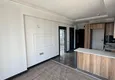 Доступная покупка Двухкомнатная квартира с чистовой отделкой в Мерсине, район Чешмели 5 