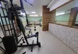 Купить Двухкомнатная квартира с застеклённым балконом в Алании, район Оба 19 